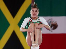 Dafne Carolina logró 99.850 puntos en sus dos turnos en la cama elástica. AP/Archivo
