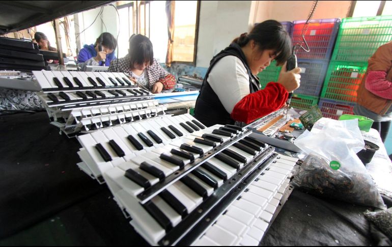 Inundaciones y clima extremo pueden estar detrás de la baja industrial en China. EFE/Archivo