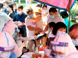 Los contagios fueron detectados en siete trabajadores migrantes en la ciudad, de los cuales cuatro no presentaban síntomas de la enfermedad. EFE / S.Zhou