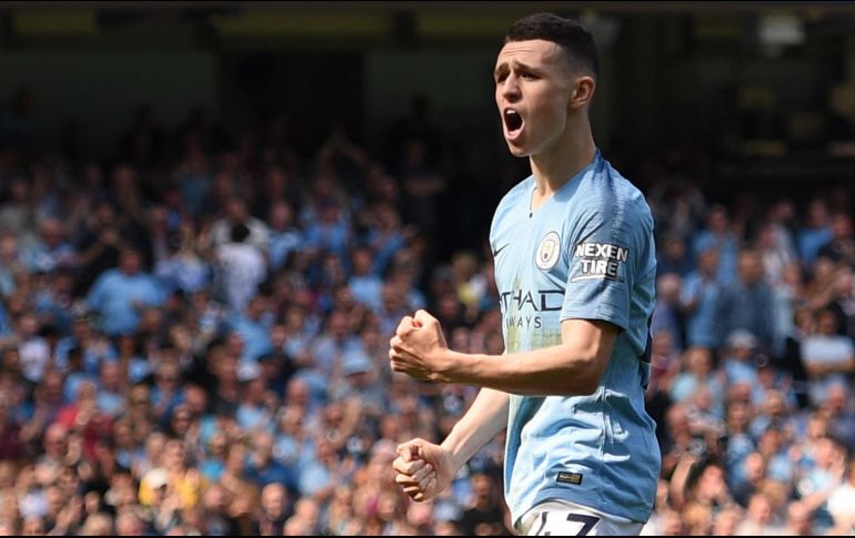 Phil Foden se perderá los duelos ante Tottenham, Norwich y Arsenal. AFP/ARCHIVO
