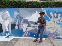 Roberto Márquez realiza una pintura con la técnica del acrílico, confirmado por tres piezas, incluye caballos, instrumentos musicales y varios músicos de mariachi, con un estilo cubista y unas dimensiones de 1.70 x 2.20 metros. EL INFORMADOR / J. Pérez