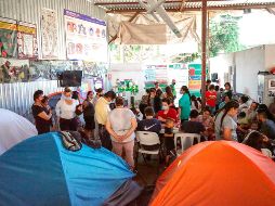 El restablecimiento del programa preocupa a migrantes, como los que acampan en el albergue El Chaparral (foto), que temen una mayor saturación de albergues y servicios sociales. EFE/J. Terríquez