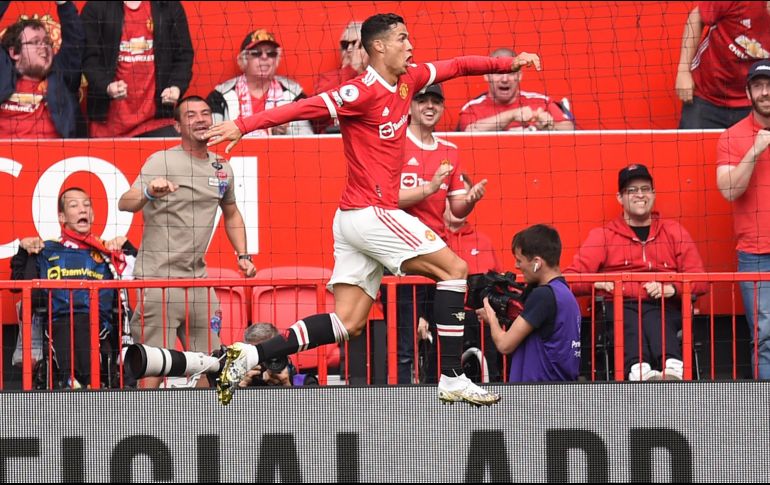 EUFORIA. Cristiano Ronaldo inicia con el pie derecho su nueva etapa con los ´Red Devils'. AFP/O. Scarff