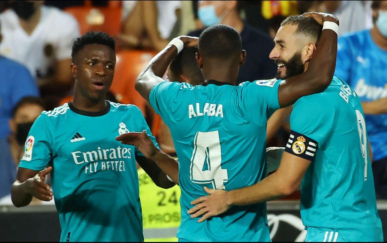 LÍDERES. El triunfo deja solo en cabeza de la tabla al Real Madrid, con trece puntos. AFP/J. JORDAN