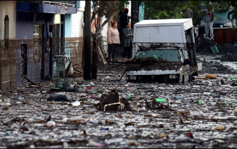 Viviendas cercanas al arroyo El Seco resultaron afectadas por inundaciones desde julio pasado. AFP/ARCHIVO
