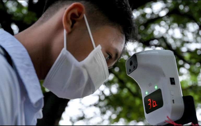 El COVID-19 puede parecer con el tiempo un resfriado porque los virus tienden a debilitarse a medida que se extienden entre la población. AFP / ARCHIVO