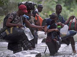 Una gran cantidad de haitianos están siendo procesados por las autoridades. AFP/ R. Arboleda