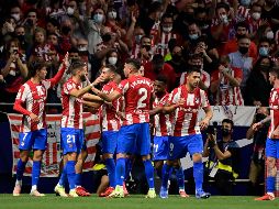 Con este triunfo, el equipo 'Colchonero' empata a puntos con el líder Real Madrid, que el domingo juega en campo del Espanyol. AFP/J. SORIANO