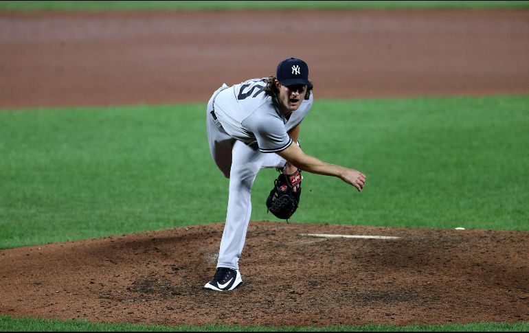 Este martes, con un interesante duelo de pitcheo entre Gerrit Cole (foto) y Nathan Eovaldi abrirán los playoffs en las Grandes Ligas 2021. AFP / ARCHIVO