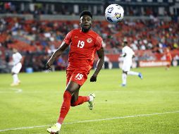 ESTRELLA. Alphonso Davies colaboró con un gol para la selección canadiense. AFP/V. RIDLEY