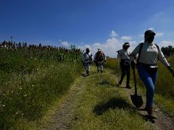 Voluntarios y autoridades buscan a desaparecidos. AP/F. Llano