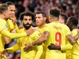 IMPARABLE. Mohamed Salah marcó un doblete para la victoria de los Reds. AFP/J. SORIANO