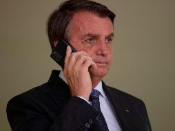El presidente de Brasil, Jair Bolsonaro, participa en el lanzamiento del Programa Nacional de Crecimiento Verde, en el Palacio de Planalto en Brasilia. EFE/J. Alves