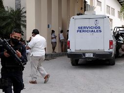 Policías y peritos acudieron al hotel donde se registró la balacera en Puerto Morelos, cerca de Cancún. REUTERS/P. Chiomante