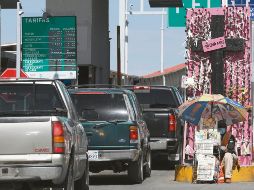 Regresan. Hoy abren el paso fronterizo entre México y EU. EFE