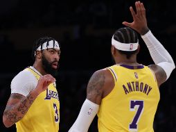 Davis sumó seis puntos en el tiempo extra, incluido un par de tiros libres que dieron a Los Ángeles una ventaja de tres puntos cuando quedaba menos de un minuto. AFP / H. How