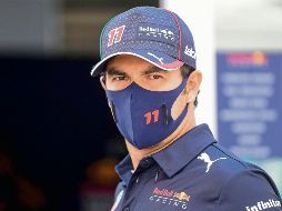 MOTIVADO. Luego de convertirse en el primer piloto mexicano en subir al podio en su país, Checo se motiva para ir por más. AFP