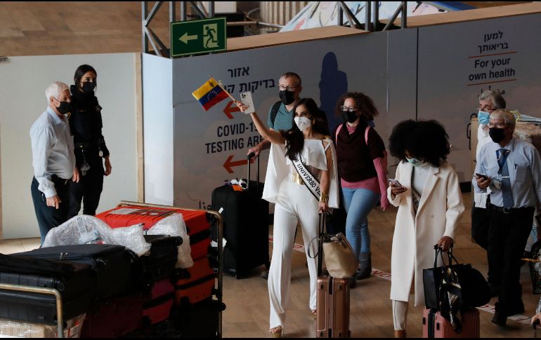 INCERTIDUMEBRE. Algunas de las participantes ya hicieron el viaje a Israel para la competencia. AFP/A. Gharabli