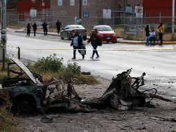 Un auto calcinado quedó afuera del hospital General de Tula, luego del ataque para liberar a reos. AP/G. Riquelme