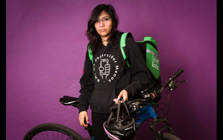 Decenas de accidentes mortales, secuestros y hasta asesinatos: los repartidores de comida de Ciudad de México se unen para reclamar, al igual que sus colegas en otros países, sus derechos laborales. AFP / O. Torres