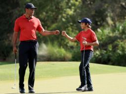 HA VUELTO. Tiger Woods y su hijo Charlie concluyeron este domingo en la segunda posición del PNC Championship. AFP/S. Greenwood