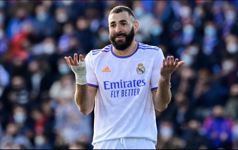 Inexplicable. Karim Benzema poco pudo hacer en el encuentro de ayer frente al equipo azulón, sin embargo, a pesar de irse en blanco, sigue como líder de goleo. AFP/ J. Soriano