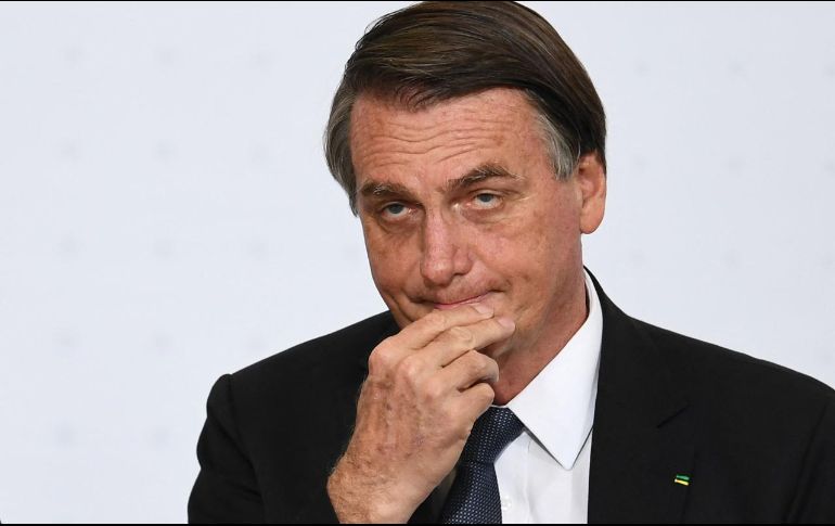 Bolsonaro recuerda que estos problemas derivan del atentado que sufrió el 6 de septiembre de 2018 al ser acuchillado en el abdomen. AFP / ARCHIVO