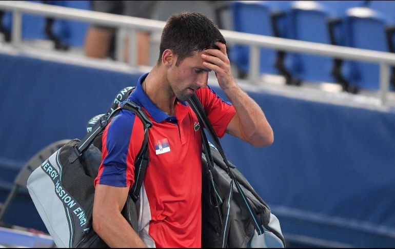 Djokovic cometió un error al llenar el formato de su visado, al no especificar que recibió la exención médica para entrar a Australia, según medios de la nación oceánica. AFP / ARCHIVO