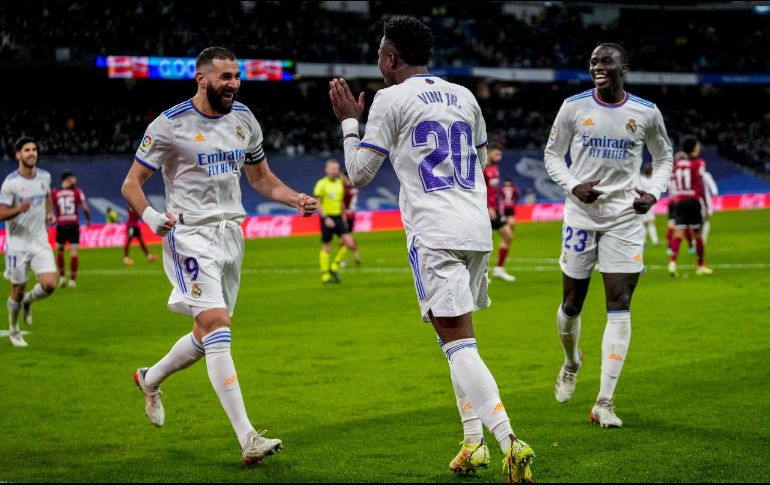 ENCENDIDOS. Entre Vinícius y Benzema, suman 36 goles en lo que va de temporada. AP/B. Amangue