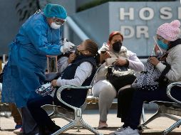 Personas acuden a módulos para detectar si tienen el virus. EFE/I. Esquivel