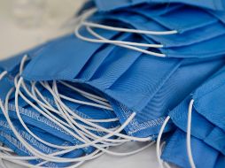 Se demostrado que el uso de cubrebocas previene contagios gracias a su función de filtración de partículas del aire. AFP / ARCHIVO