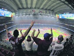 Los aficionados de los Patriotas celebraron con júbilo el quinto título de su equipo. AP / C. Riedel