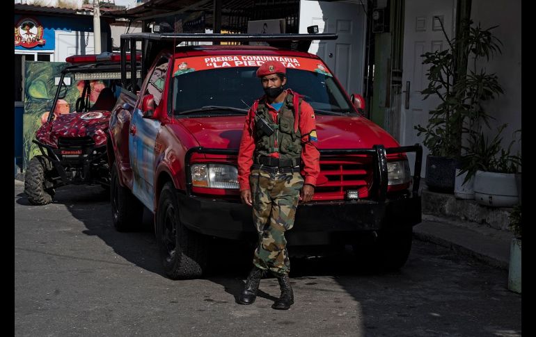 Hugo Chávez es venerado como una deidad en La Piedrita. AFP/Y. Cortez