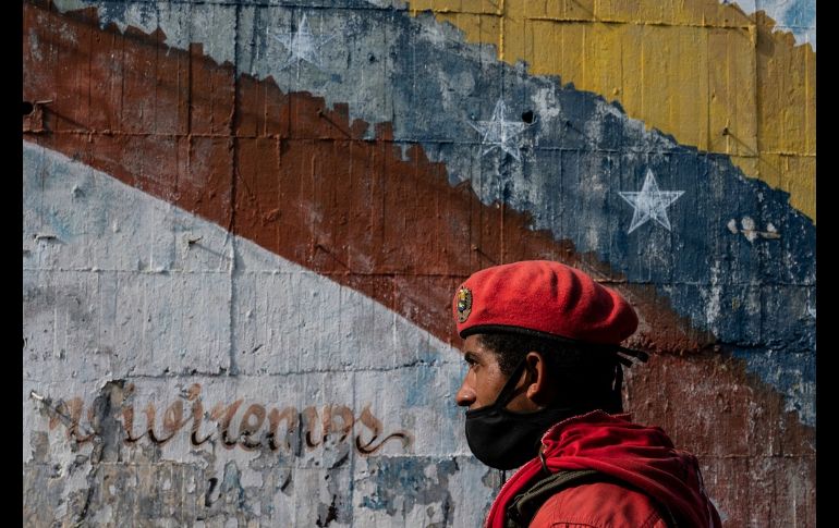 Hugo Chávez es venerado como una deidad en La Piedrita. AFP/Y. Cortez