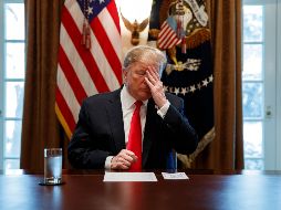 La semana pasada, los Archivos Nacionales también revelaron que Trump tenía la costumbre de romper algunos de sus documentos de trabajo, otra práctica contraria a la ley de 1978. AP / ARCHIVO