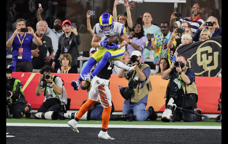 ESTOCADA FINAL. Cooper Kupp recibió en zona de anotación y los Rams le dieron la vuelta. AFP/A. Lyons