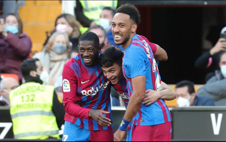Balance. El equipo de Xavi Hernández mostró un equilibrio en todas sus líneas que se reflejó en el marcador final. AFP