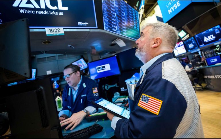 De las treinta cotizadas del Dow Jones, destacaron Walmart, Amgen, International Business Machines y Johnson & Johnson. AP/C. Crow