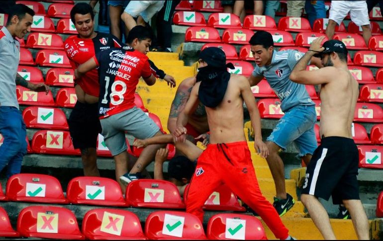 Aseguran que en el estadio no había policías, sólo personal de seguridad privada. AFP/E. Gómez