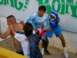 La violencia se generó durante el partido del sábado de Querétaro contra Atlas. AP