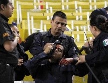 En el partido de Atlas vs Monterrey en el Torneo Apertura 2014 hubo agresiones a policías que resultaron lesionados. ESPECIAL
