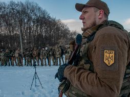 Acompañando a los mexicanos que huyen de la guerra, viajan ucranianos, ecuatorianos, un peruano, un australiano y hasta un perro. EFE / V. Zhlobsky