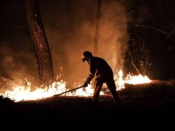 Aunque el fuego fue controlado, hasta el momento continúa la alerta atmosférica en la ZMG. TWITTER / @EnriqueAlfaroR
