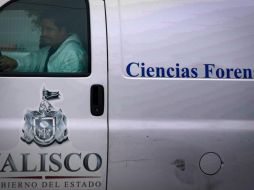 Los cuerpos son trasladados a la morgue por peritos del Ciencias Forenses, mientras que el agente del Ministerio Público realiza las indagatorias correspondientes. EL INFORMADOR / ARCHIVO