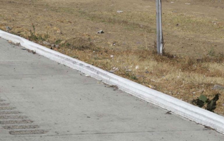 El cuerpo de la mujer se encontraba abandonado en la carretera México-Cuautla entre un montículo de piedras. SUN/ARCHIVO