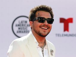 En las imágenes se muestra a Christian Nodal acompañado por la modelo mexico-americana Natalie López, quien replicó su sesión fotográfica con el cantante. EFE / ARCHIVO