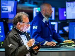 Al cierre de la Bolsa de Nueva York, los inversionistas tuvieron un ligero alivio por los números positivos. AP/C. Crow