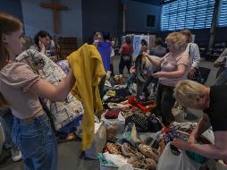 Son 88 familias que se han mudado a casas provisionales construidas en Leópolis. AFP/N. Almeida