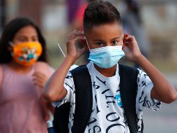 Los casos graves se producen con mayor frecuencia en los niños y están relacionados con la magnitud de la exposición al virus, el estado de salud del paciente y la gravedad de las complicaciones. AP / ARCHIVO