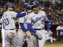 La ofensiva de los Dodgers se activó pronto con dobles consecutivos de Mookie Betts y Freeman en el primer capítulo. AFP / C. Coduto